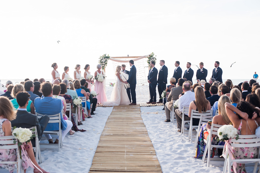 Boho Florida Beach Wedding Ceremony With Bamboo Ceremony Aisle