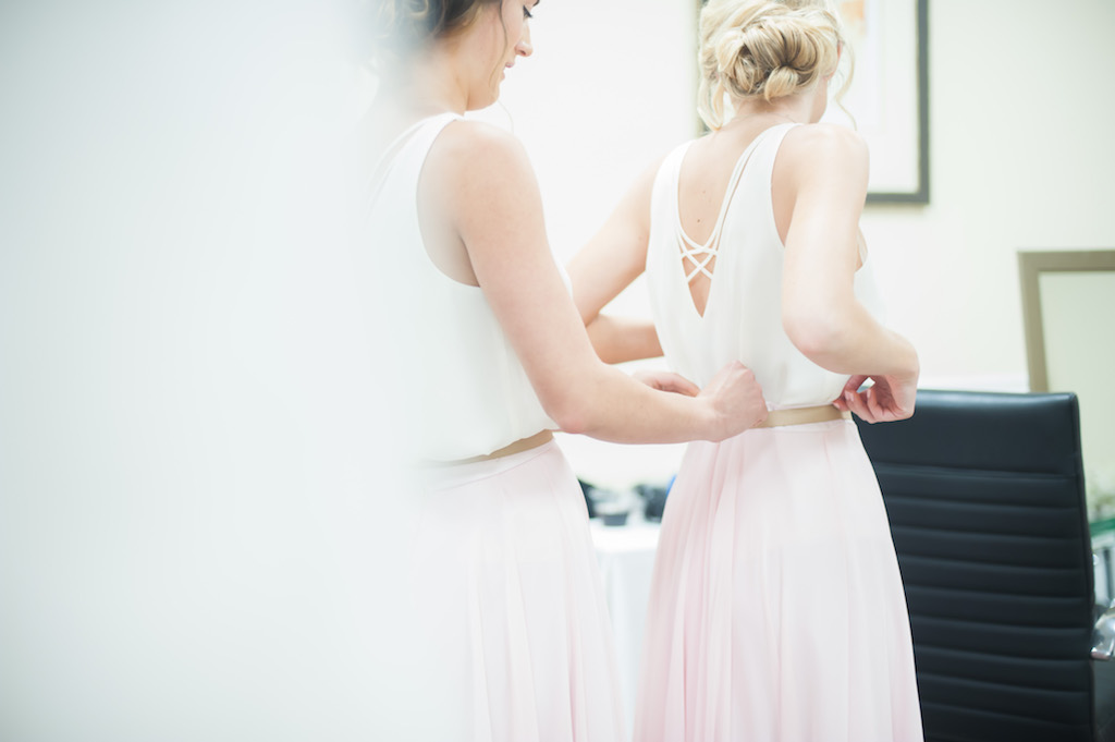 Bridesmaids Getting Ready Portrait with Two Piece White Tops and Long Blush Pink Skirts | Boho Wedding Style