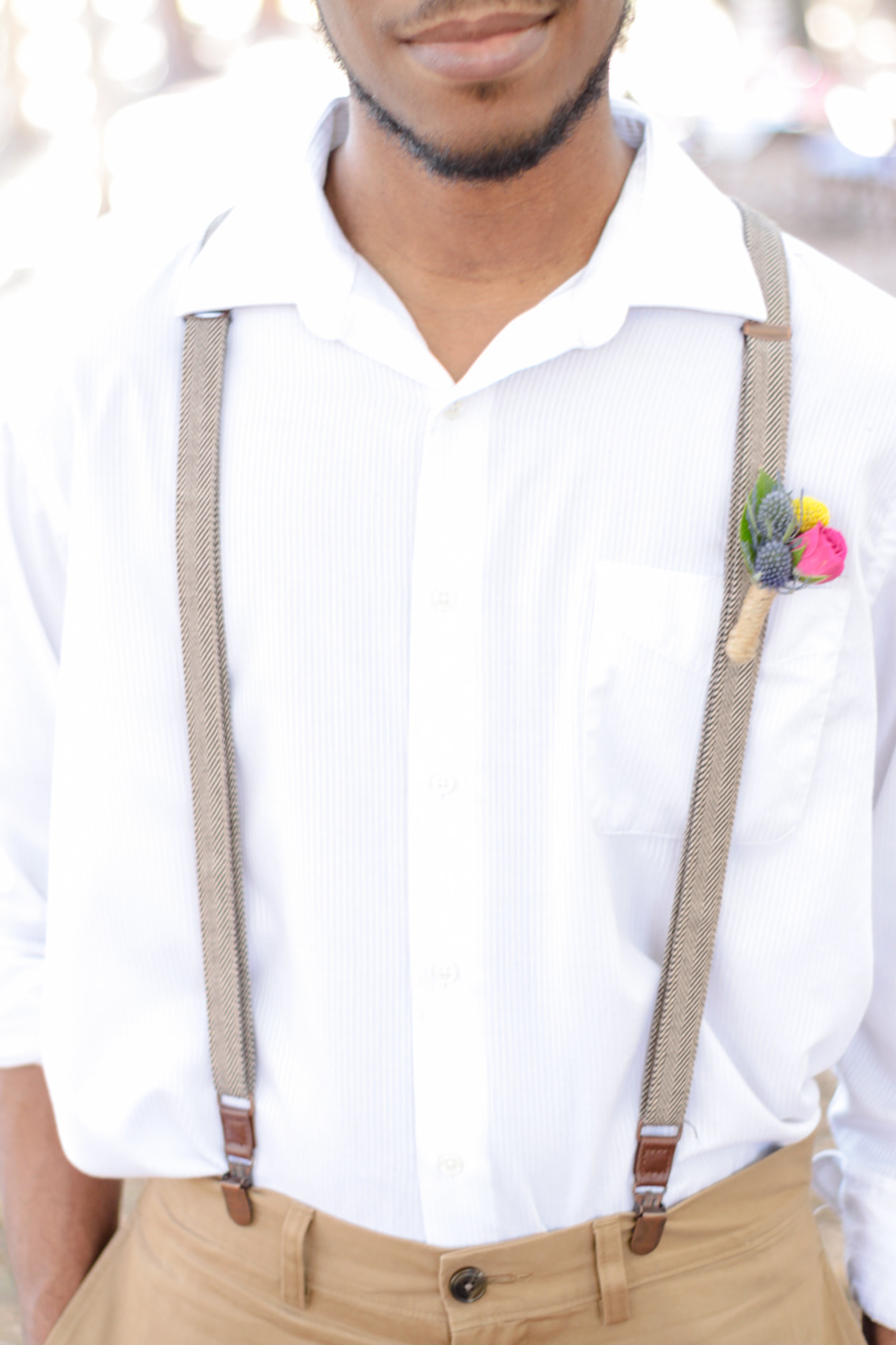 Summer Floral Bohemian Wedding Groom Style Portrait with Suspenders and White Cotton Shirt, with Succulent, Pink and Yellow Floral Twine Wrapped Boutonniere