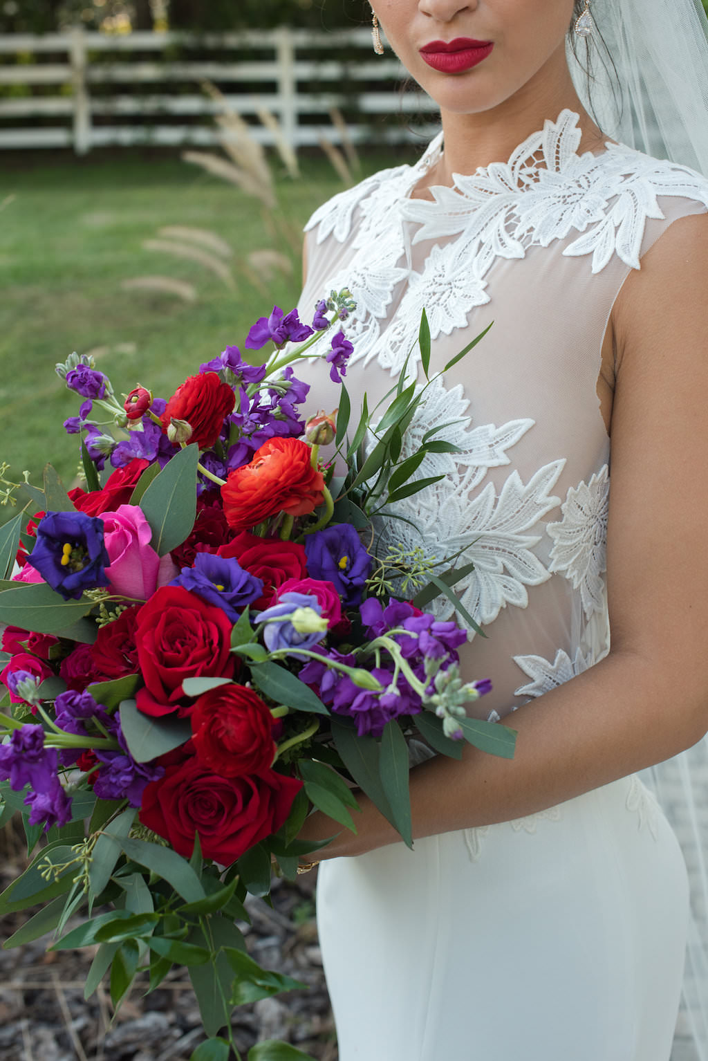 Outdoor Wedding Portrait with Red, Purple, and Greenery Bouquet from Tampa Florist Northside Florist, in Daalarna Couture Illusion Lace Wedding Dress from The Bride Tampa | Caroline & Evan Photography