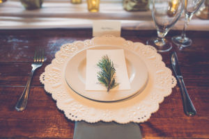 Elegant Modern Rustic Wedding Reception Table Decor with Ceramic Lace Charger and Rosemary on Gray Linen