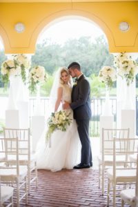 8Elegant Wedding Ceremony Portrait with Tall Hydrangea Florals with Greenery in Bold White Vases on Pedestals and White Chiavari Chairs | Tampa Bay Country Club Wedding Venue The Palms Tampa Golf & Country Club | Tampa Wedding Rentals A Chair Affair | Wedding and Event Planner Love Lee Lane | Florist and Rentals Gabro Event Services