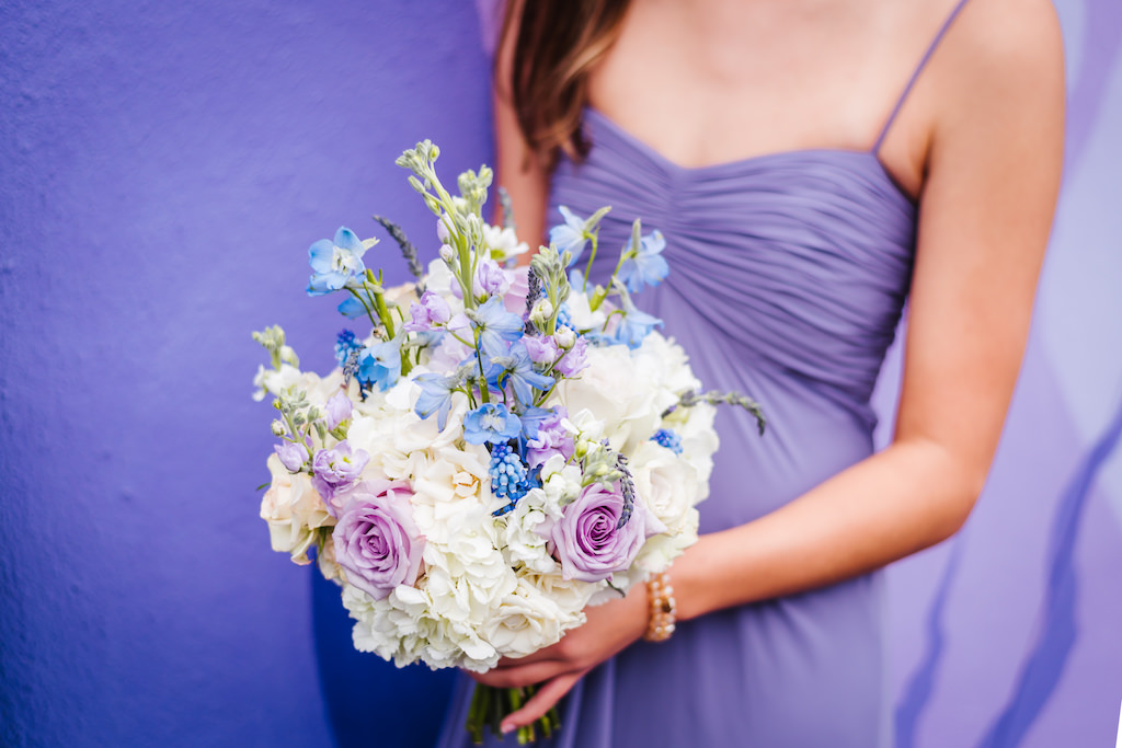 Bridesmaid Portrait wearing Spaghetti Strap Dusty Purple Dessy Dress with White Hydrangea, Purple Rose and Blue Flower with Greenery Bouquet