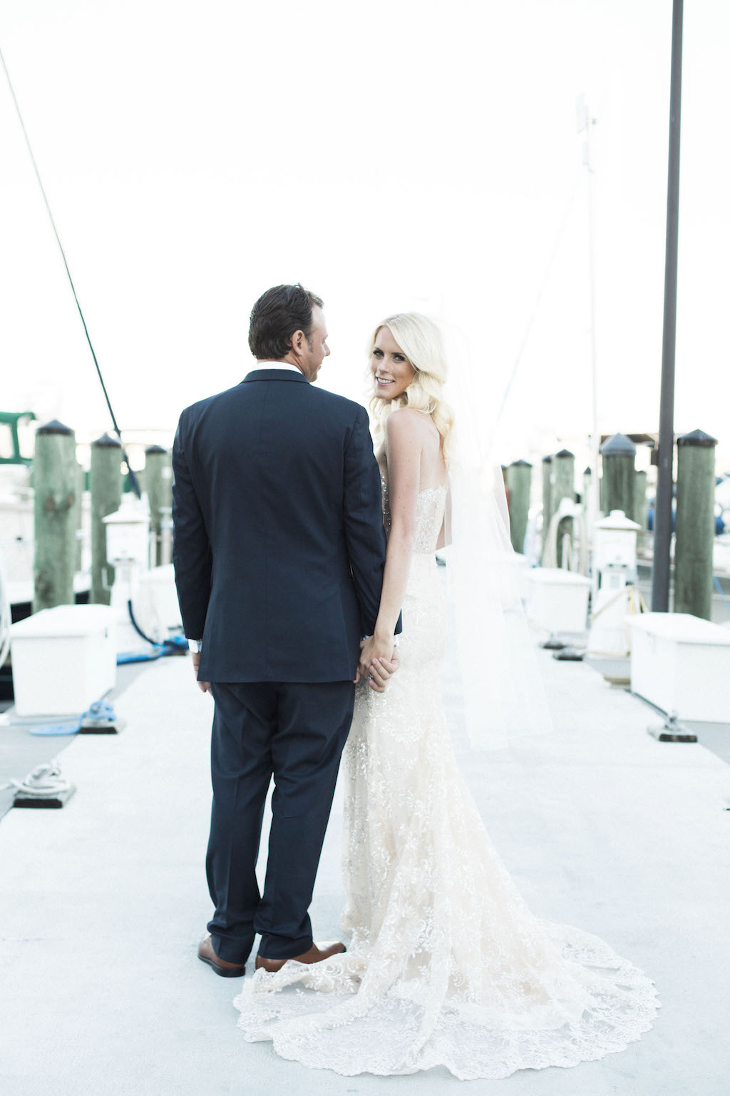 Outdoor Waterfront Bride and Groom Wedding Portrait on Dock | Sarasota Wedding Venue Sarasota Yacht Club