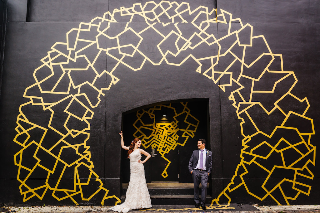 White and Dusty Purple Wedding Downtown St Pete Creative Bride and Groom Portrait with Graffiti Mural Street Art