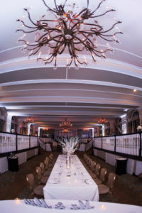 Winter White and Silver Black Tie Hotel Ballroom Wedding Reception with Long Feasting Table with Tall White Branch Centerpiece | Tampa Bay Historic Wedding Reception Venue The Don Cesar