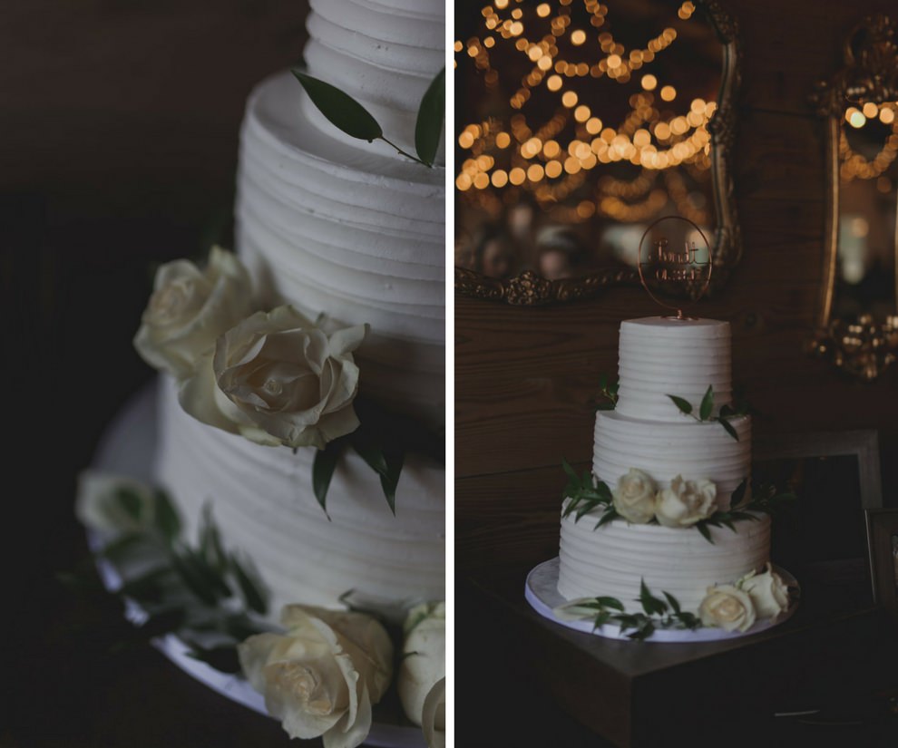 Rustic Barn Wedding Three Tier Round White Wedding Cake with Ivory Roses and Greenery on Wooden Box Cake Stand with Circular Gold Cake Topper | Tampa Bay Wedding Cake Bakery Alessi Bakery