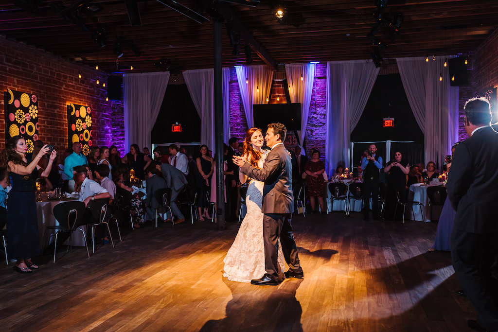 First Dance Portrait at Modern Purple and White Wedding Reception at Historic Exposed Brick Downtown St Pete Wedding Venue NOVA 535