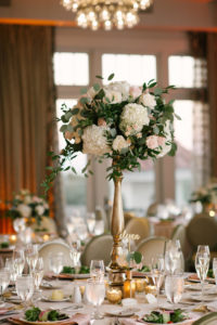 Blush and Gold Wedding Reception Table Decor with Tall White Hydrangea and Pink Rose with Greenery Bouquet in Tall Gold Vase | Tampa Bay Boutique Hotel Wedding Venue The Birchwood
