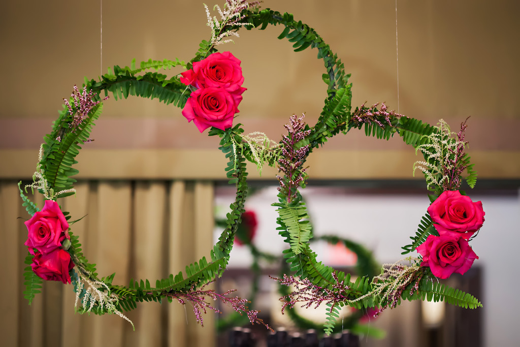 Ballroom Wedding Reception Hanging Magenta Rose, Purple Flower, and Fern Hanging Woven Wreath Decor | Tampa Bay Wedding Florist Gabro Event Services