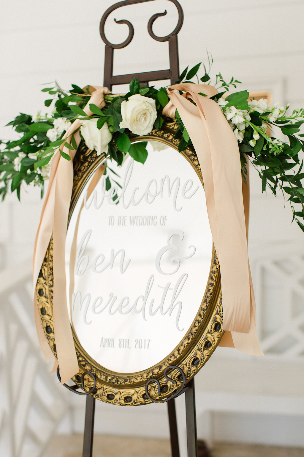 Old Florida Inspired Wedding Reception Welcome Sign on Vintage Gold Mirror with White Rose and Greenery Floral Garland with Long Gold Ribbons | Tampa Bay Wedding Planner Glitz Events