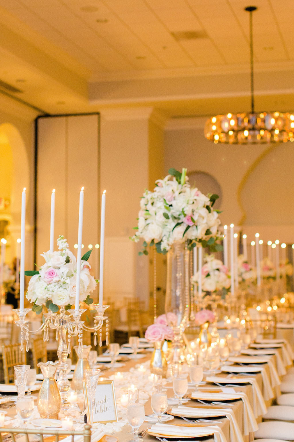 Gold and Ivory with Black and Blush Accent Hotel Ballroom Wedding Reception Long Feasting Table with Tall White, Pink and Greenery Centerpiece and Tall Candleholders with Gold Chiavari Chairs and Blush Linens | Downtown St Pete Historic Hotel Wedding Venue The Vinoy Renaissance | Tampa Bay Wedding Planner Love Lee Lane