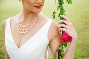 Outdoor Bridal Portrait in V-neck Wedding Dress with Three Strand Pearl Necklace | Tampa Bay Wedding Hair and Makeup Michele Renee The Studio | Bridal Shop Truly Forever Bridal