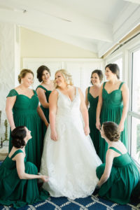 White and Green Old Florida Inspired Wedding Bridal Party Getting Ready Portrait, Bride in V Neck Madeline Gardner Wedding Dress, Bridesmaids in Green Watters Bridesmaids Dresses | Tampa Bay Wedding Photographer Ailyn La Torre Photography