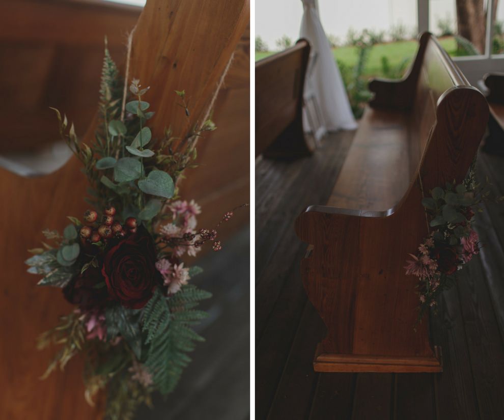 Rustic Farm Wedding Ceremony Decor with Wooden Church Pews and Dusty Rose, Maroon and Natural Ferns and Greenery Floral Arrangements | Tampa Bay Wedding Venue Cross Creek Ranch