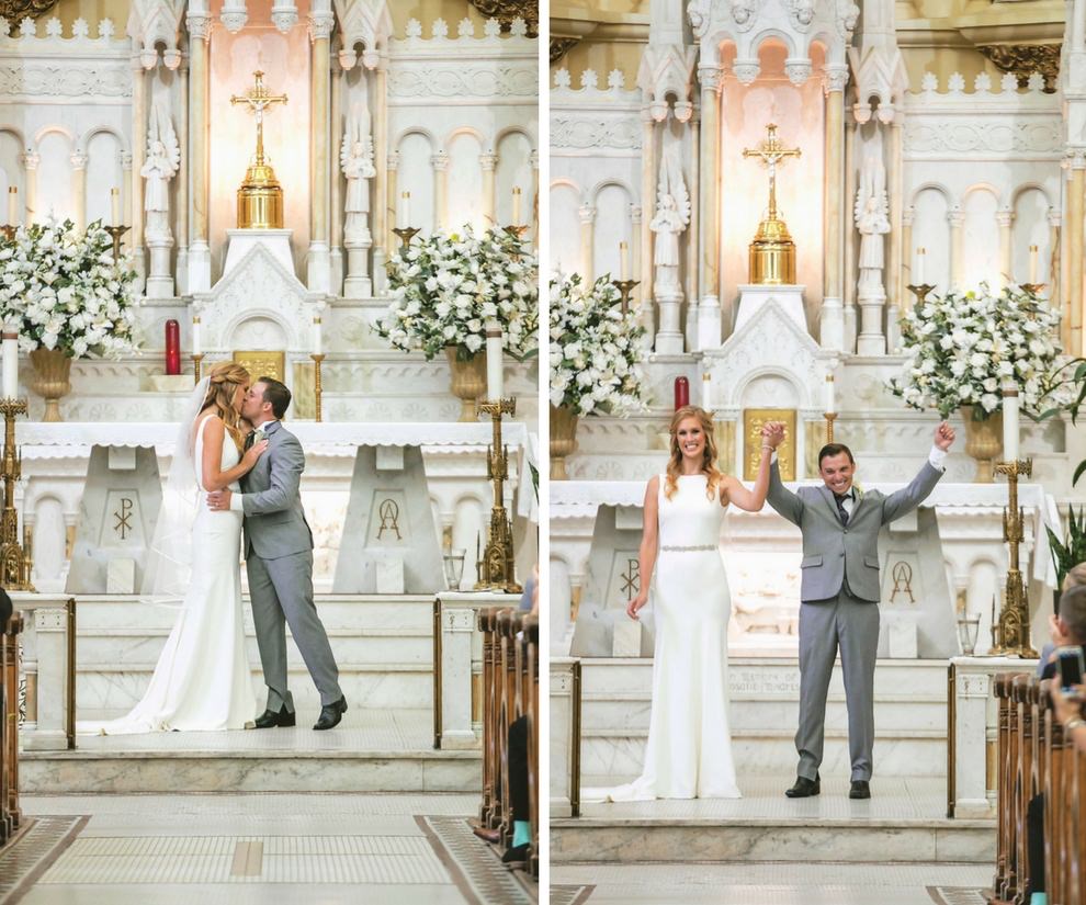 Traditional Wedding Ceremony First Kiss Portrait, Bride in Belted A Line Wedding Dress, Groom in Grey Suit | Downtown Tampa Wedding Ceremony Venue Sacred Heart Catholic Church