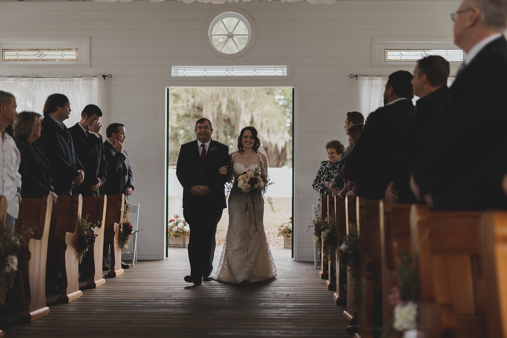 Rustic Church Wedding Ceremony Portrait, Bride with White, Blush, and Maroon Rose Bouquet with Wild Greenery and Long Champagne and Dark Red Ribbon | Tampa Bay Wedding Photographer Stacy Paul Photography | Dover Florida Wedding Venue Cross Creek Ranch