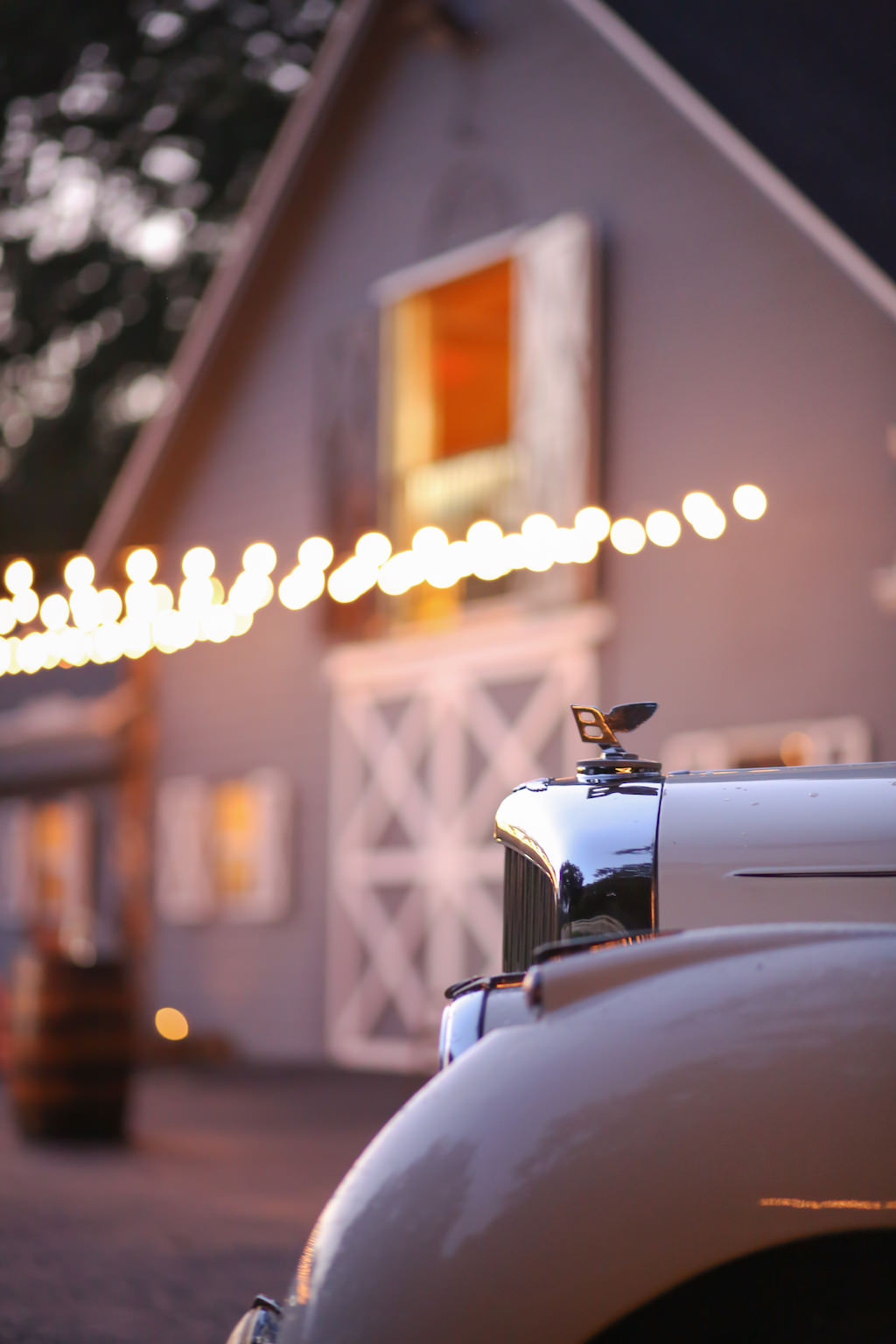 Barn Wedding Reception Exterior with Antique Rolls Royce Car and String Lights | Tampa Bay Rustic Wedding Venue Lange Farm