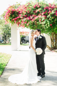 Outdoor Garden Bride and Groom Wedding Portrait, Bride with Ivory Rose Bouquet, Groom with White Rose and Greenery Bouquet | Tampa Bay Wedding Photographer Ailyn La Torre Photography | Downtown St Pete Vinoy Park