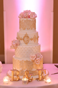 Four Tier Round White and Gold with Blush Flower Fairytale Wedding Cake, with Elegant Bride and Groom Initials
