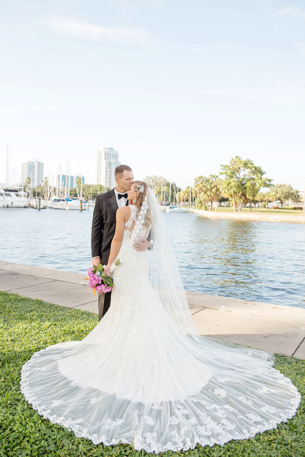 Outdoor Waterfront Bride and Groom Wedding Portrait with Pink Peony with Greenery Bouquet and Long Vintage Wedding Veil | St Pete Wedding Photographer Kristen Marie Photography
