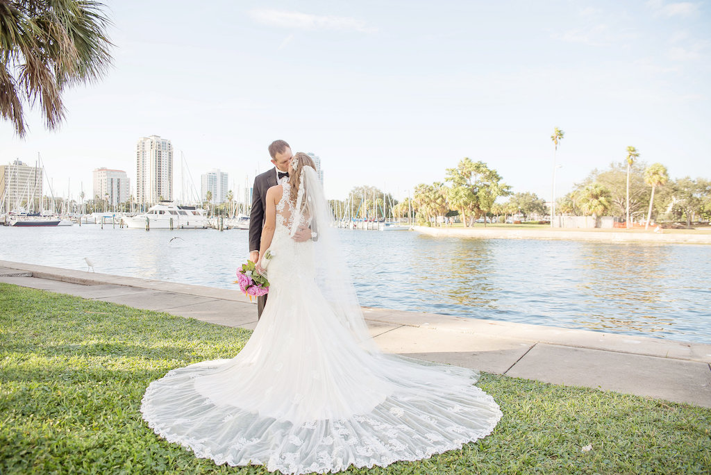 Outdoor Waterfront Bride and Groom Wedding Portrait with Pink Peony with Greenery Bouquet and Long Vintage Wedding Veil | St Pete Wedding Photographer Kristen Marie Photography | Historic Downtown St Pete Outdoor Wedding Ceremony Venue The St Petersburg Museum of Art