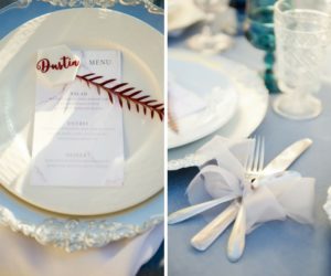 French Countryside Themed Wedding Reception Table Decor with Flatware in White RIbbon, and Burgundy Red Greenery on Pink Marble Printed Menu on Blue Linen | Tampa Wedding Papergoods A & P Designs | Tampa Bay Wedding Planner Kelly Kennedy Weddings & Events