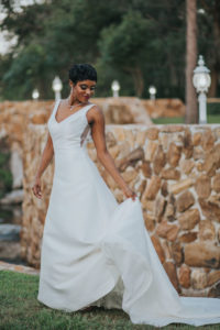 Outdoor Garden Bridal Portrait in A Line V Neck Wedding Dress with Sheer Sides | Tampa Bay Wedding Dress Boutique Truly Forever Bridal | Photographer Brandi Image Photography | Hair and Makeup Michele Renee The Studio