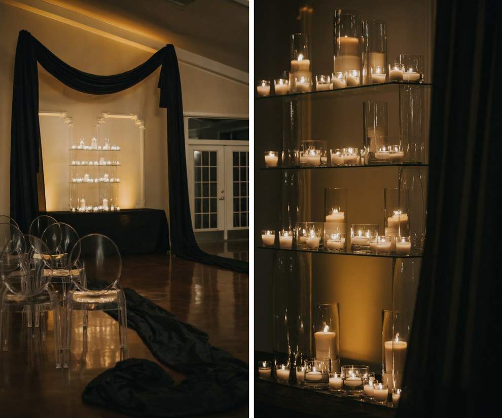 Modern, Sophisticated Black and White Wedding Ceremony Decor with Black Draping, Clear Plastic Chairs, and Pillar Candles in Glass Hurricane Lanterns | Dade City Florida Ballroom Wedding Venue Stonebridge at the Lange Farm | Tampa Bay Wedding Planner UNIQUE Events | Wedding Rentals A Chair Affair