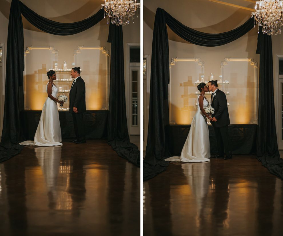 Modern, Sophisticated Black and White Wedding Ceremony Portrait With Black Draping and Pillar Candles | Tampa Bay Wedding Photographer Brandi Image Photography | A Line Wedding Dress Truly Forever Bridal | Groom's Tuxedo from Sacino's Formalwear | Wedding Planner UNIQUE Events