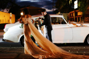 Outdoor Nighttime Wedding Portrait, Bride and Groom with Classic Car, Bride in Inbal Dror Wedding Dress