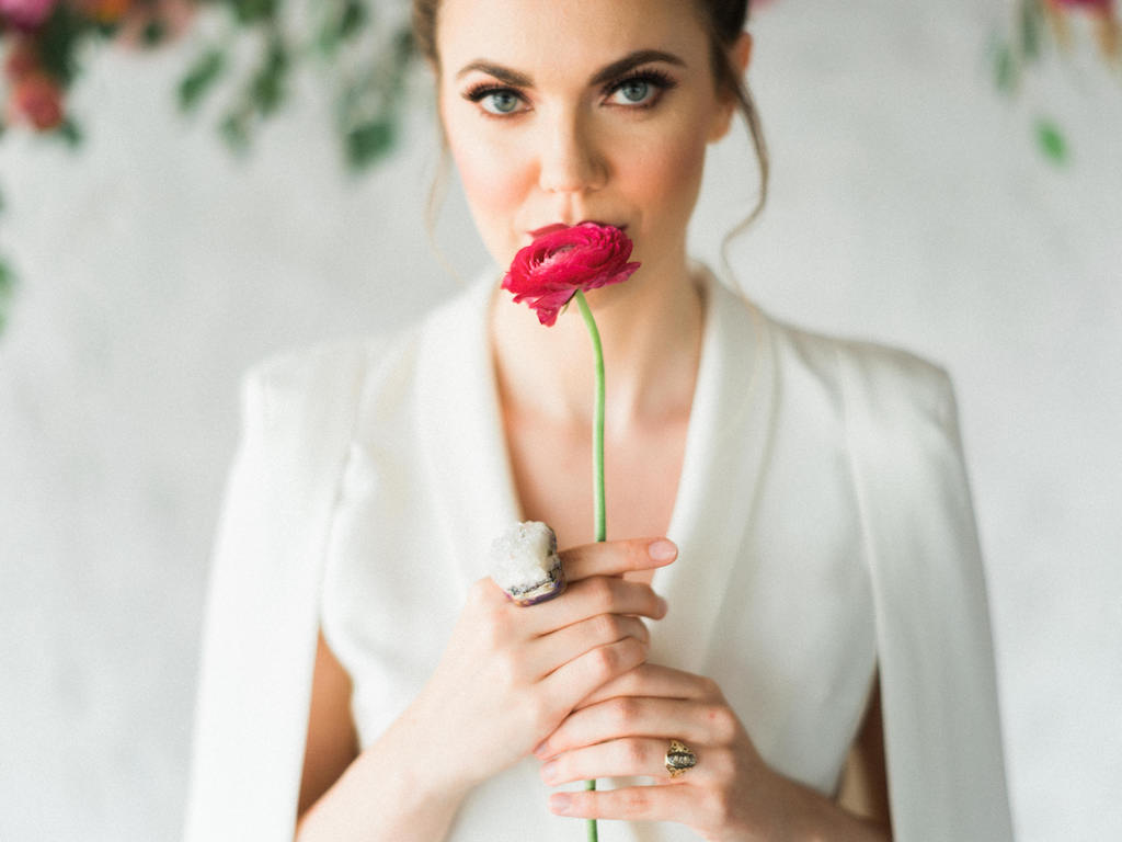 Modern Bride with Oversized Adina Mills Geode Ring wearing Lavish Alice White Jumpsuit with Cape