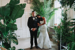 Modern Indian Wedding Bride and Groom Portrait, Bride in Strapless Mermaid Wedding Dress, Groom in Black Tuxedo with White Rose Boutonniere | Tampa Wedding Photographer Grind and Press Photography