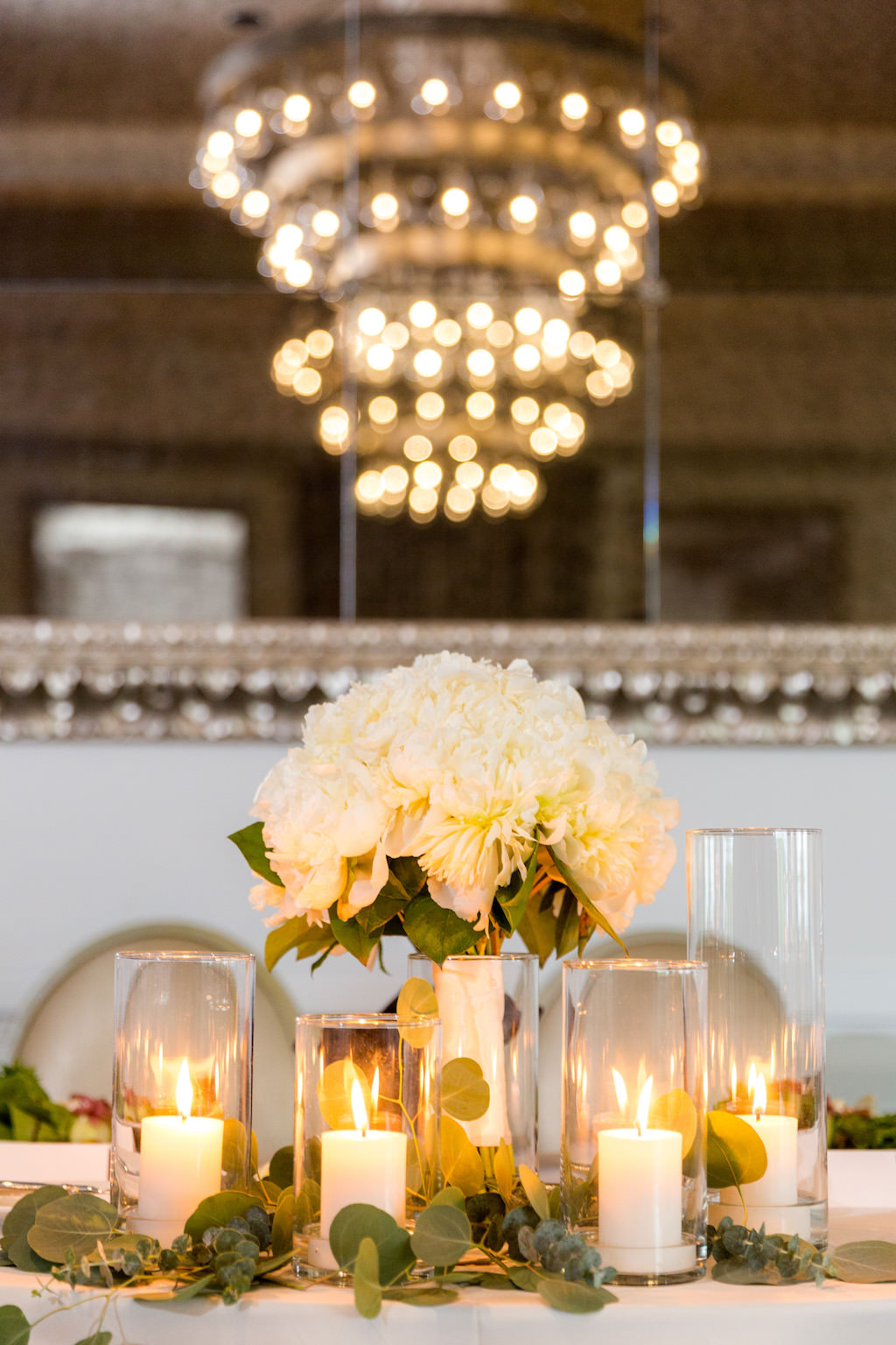 Vintage Hotel Ballroom Wedding Reception Sweetheart Table with White Peony with Greenery Centerpiece and Votive Candles | Tampa Bay Wedding Venue The Birchwood | Florist Cotton and Magnolia