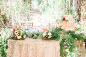 Outdoor Whimsical Garden Wedding Inspiration with Sweetheart Cake Table with Sequined Linens | Over the Top Linen Rentals