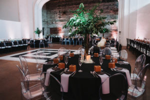 Modern Black and White Indian Wedding Reception with Black Linens, Clear Plastic Oval Back and Black Chiavari Chairs, and Tall Greenery Centerpieces and Black and White Geometric Dancefloor | Tampa Bay Historic Wedding Venue The Rialto Theater | Planner Glitz Events
