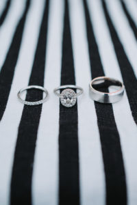 Wedding Band, Engagement Ring on Black and White Linen