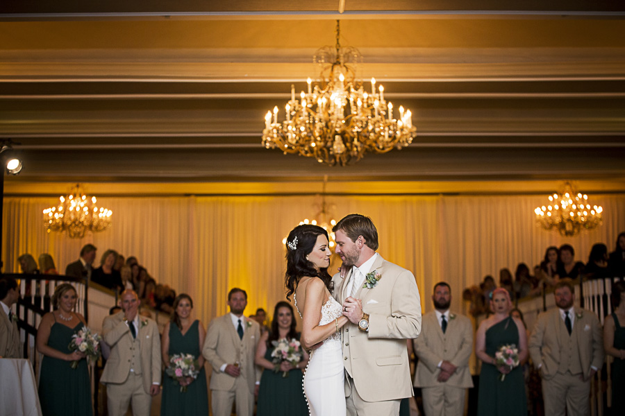 Green and Pink Hotel Ballroom Wedding Reception First Dance Portrait, Groom in Tan Suit with Succulent Boutonniere, Bridesmaids in MIsmatched Hunter Green Dresses | St Pete Wedding Venue The Don CeSar
