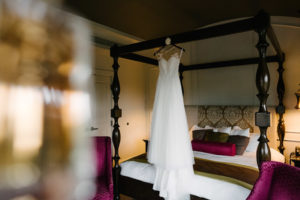 A Frame Watters Wedding Dress on Hanger