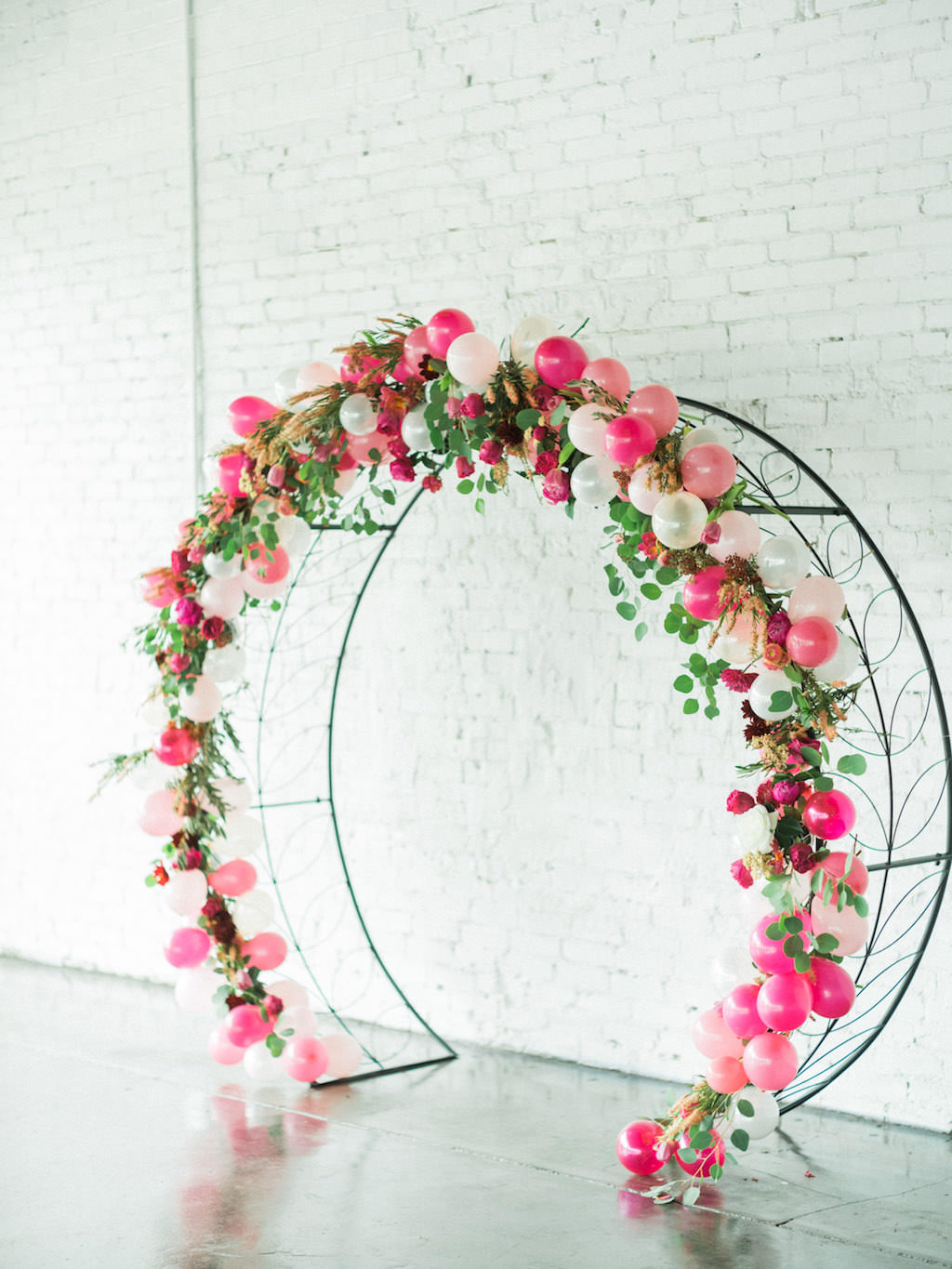 Pink and White Balloon, Branches, Greenery and Fuchsia Flowers Iron Circle Modern Wedding Arch | Lakeland Industrial Wedding Venue Haus 820