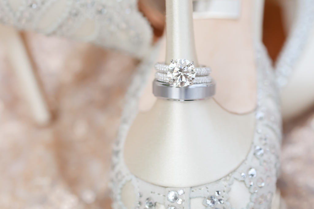 Diamond Engagement Ring and White Gold Wedding Band on Heel of Badgley Mischka Wedding Shoes