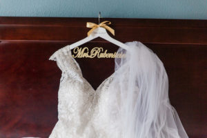 White Lace Wedding Dress on Custom Mrs Gold and White Hanger