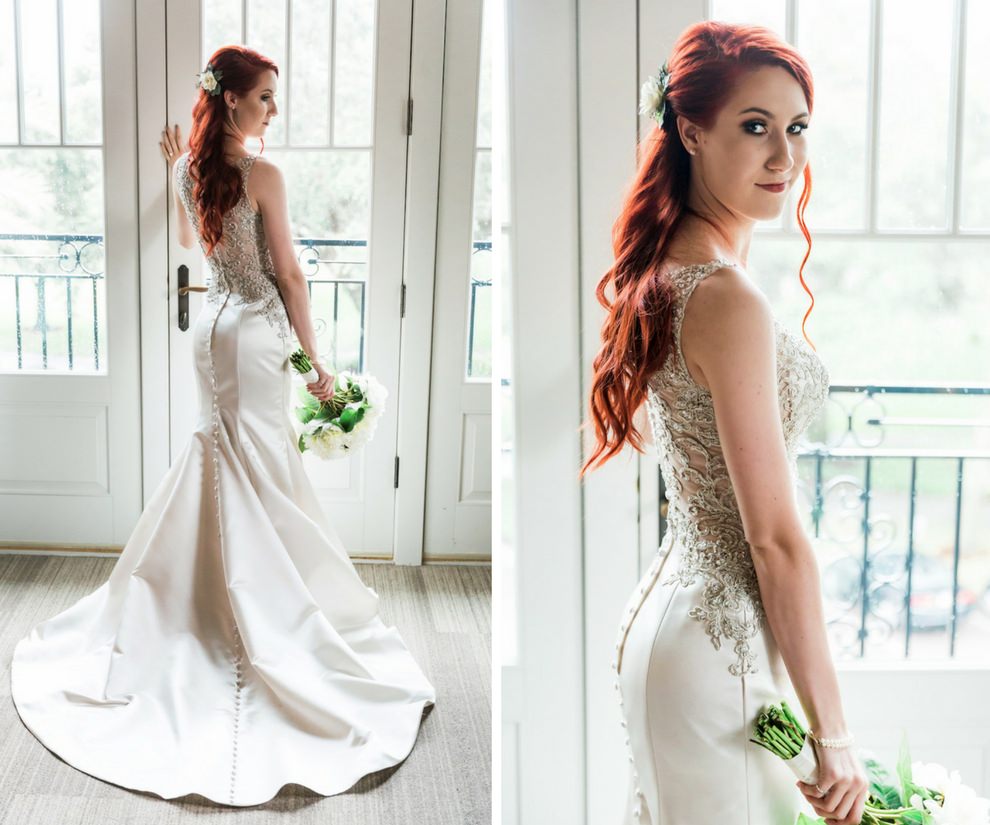 Interior Bridal Portrait wearing Illusion Lace Jeweled Allure Bridal Trumpet Wedding Dress