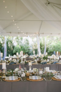 Outdoor Tented Wedding Reception with Organic Greenery Inspired Decor, Long Feasting Tables and Candle Centerpieces | Sarasota Wedding Planner Jennifer Matteo Event Planning
