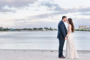 Beach Wedding Portrait, Bride in Lace Stella York Dress, Groom in Navy Blue Suit | Waterfront Hotel Wedding Venue The Westin Tampa Bay