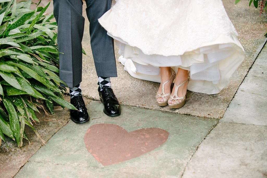 Outdoor Garden Bride and Groom Portrait, Bride in Open Toe Strappy Silver Sandal Wedding Shoes, Groom with Grey Argyle Socks