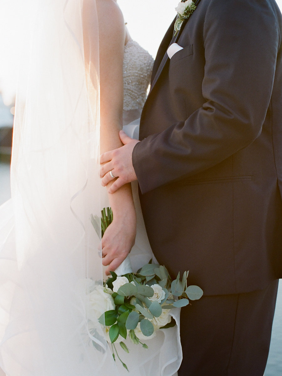 Outdoor Bride and Groom Wedding Portrait with White Rose and Natural Greenery Bouquet