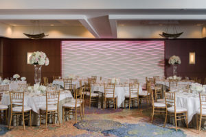 Hotel Ballroom White and Blush and Gold Wedding Reception, with Tall White Hydrangea and Pink Rose Centerpieces in Glass Vases, with Gold Chiavari Chairs | Venue The Westin Tampa Bay