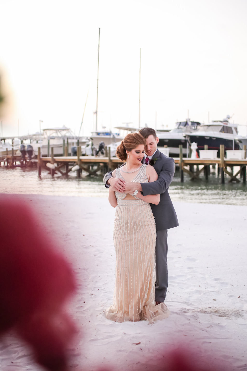 Outdoor Beach Wedding Portrait, Bride in Jeweled Ivory Open Backed Dress, Groom in Gray Suit | Tampa Bay Waterfront Wedding Venue Isla Del Sol Yacht and Country Club | Dress Shop Truly Forever Bridal | Menswear Sacino's Formalwear | Hair and Makeup Michele Renee The Studio | Photographer Lifelong Studios Photography