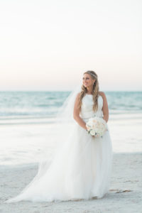 Outdoor Beach Wedding Portrait, Bride in Halter Ballgown Hayley Paige Wedding Dress with White Rose Bouquet and Jeweled Headband | Whimsical Clearwater Beach Wedding